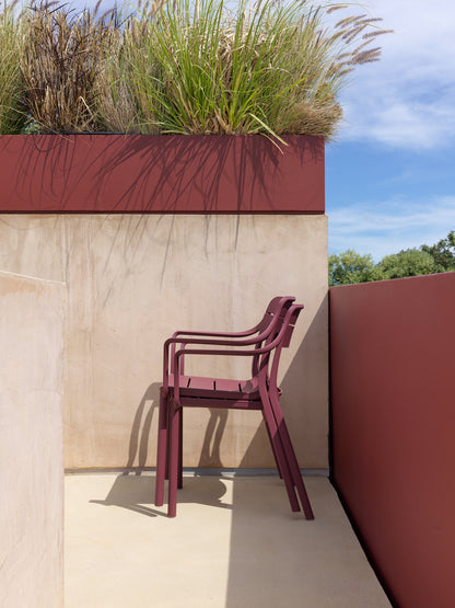 sedia da esterno con braccioli impilabile cassia armchair nardi rosso borgogna genco outdoor